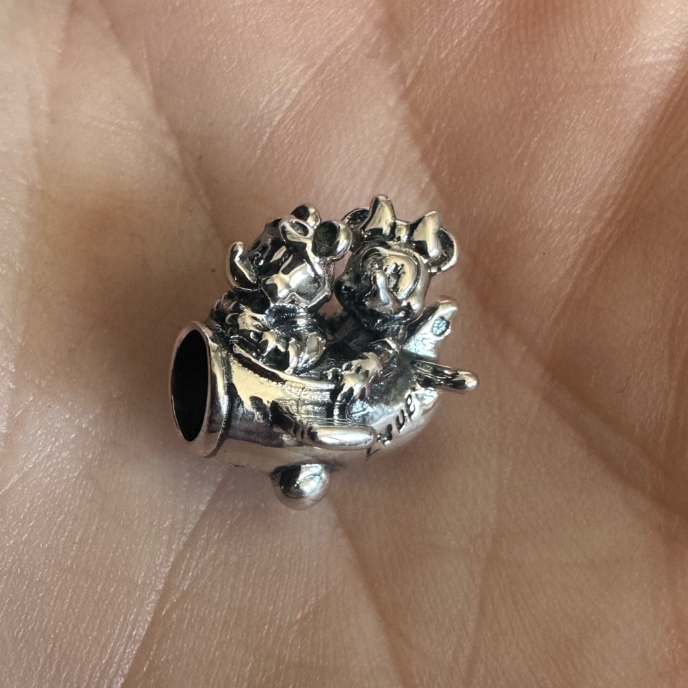 Mickey and Minnie Mouse in an airplane sliding bracelet charm